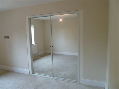 Simple Mirrored Sliding Closet Doors
