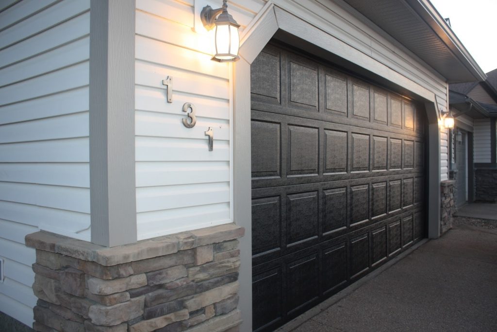 Black Painting Garage Door — Randolph Indoor and Outdoor Design