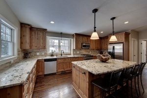 Alaskan White Granite Countertops Beige Cabinets