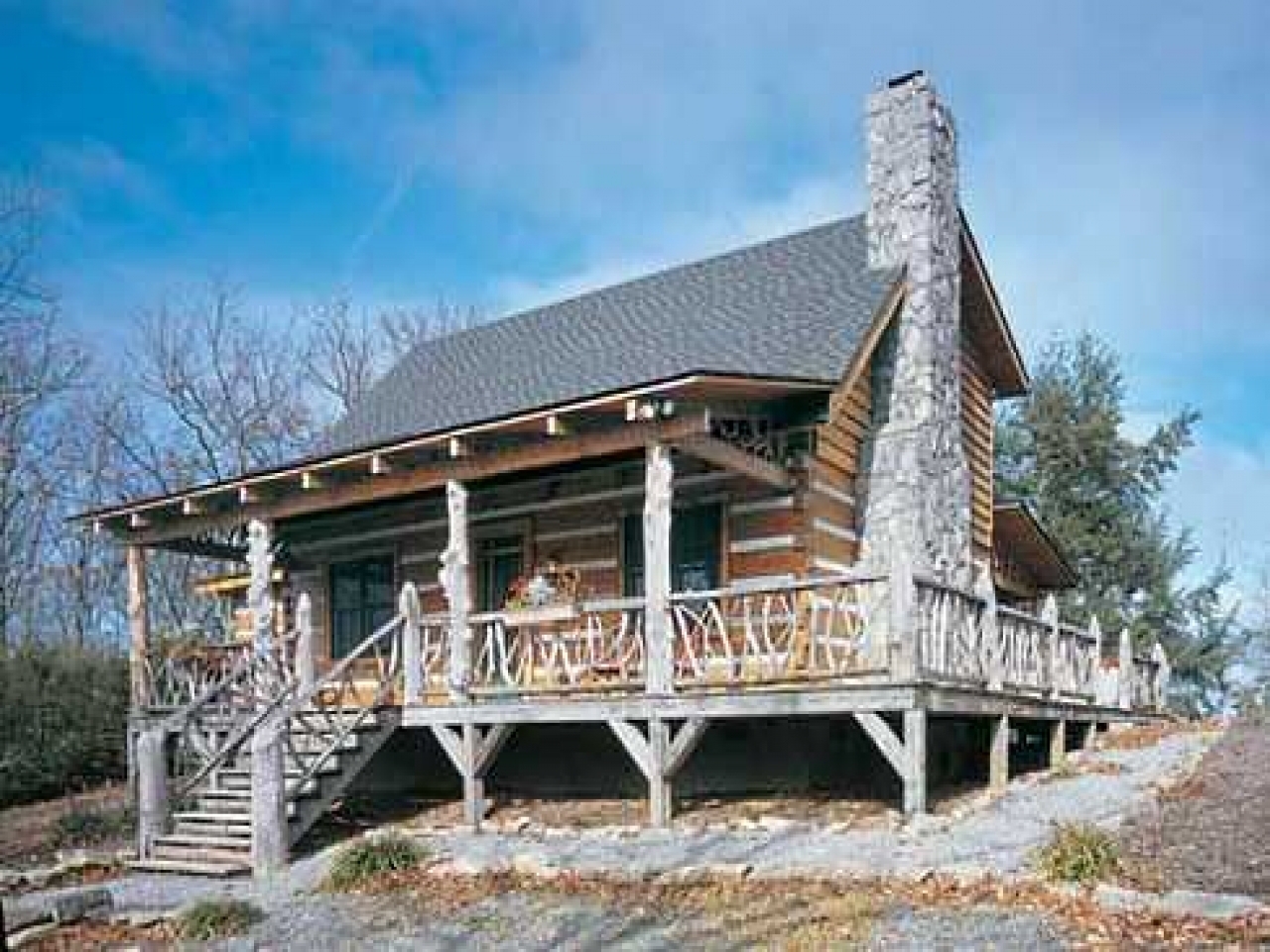 Log Cabin Home With Wrap Around Porch